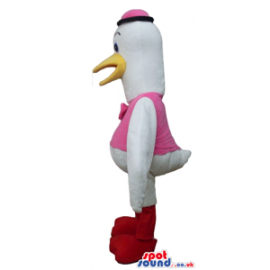 White duck with red legs wearing a pink vest, a pink bow tie