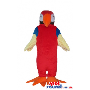 Red penguin with blue and white wings, orange feet and beak and