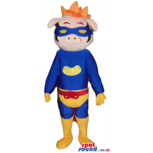 Pink pig dressed as a superhero in a blue suit with yellow