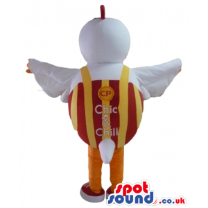 white cock with red hair and yellow leg with a red and orange