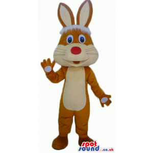 Smiling brown rabbit with long ears, a big red nose, a beige