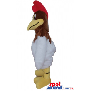 White cock with brown head, big yellow beak, red hair and beard