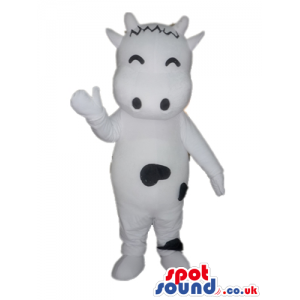 Happy white cow with a few black dots - Custom Mascots