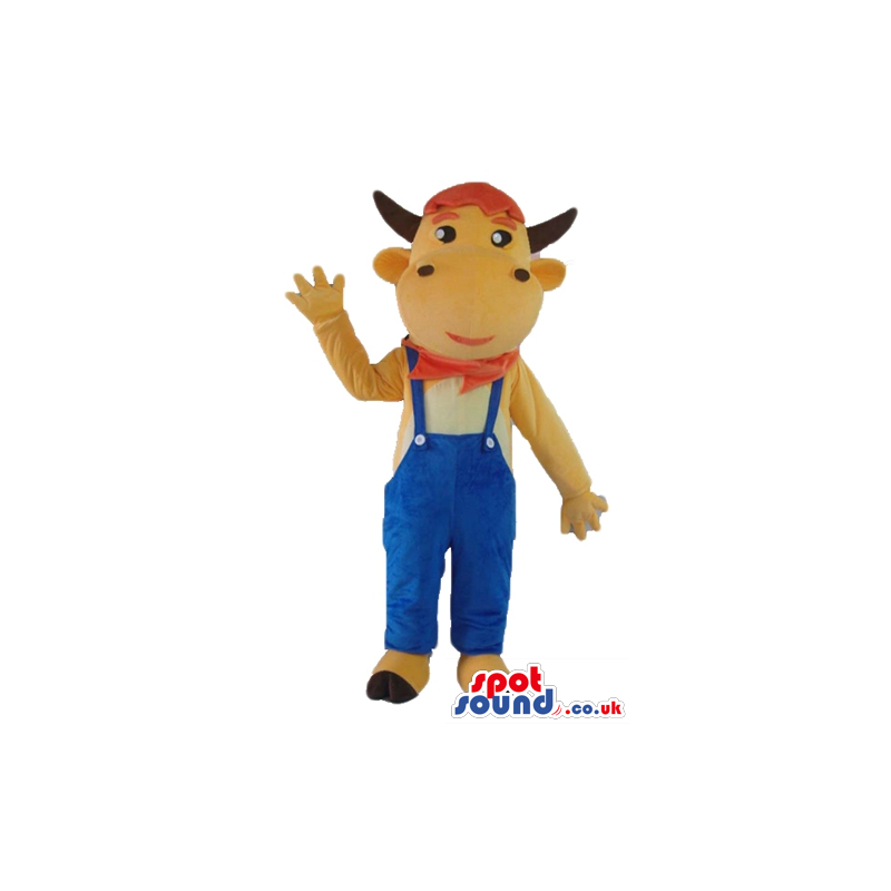 Beige cow wearing blue gardener trousers, a red handkerchief