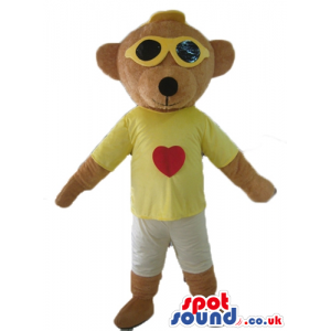 Fashionable beige bear wearing yellow-framed dark glasses, a