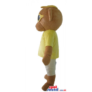 Fashionable beige bear wearing yellow-framed dark glasses, a