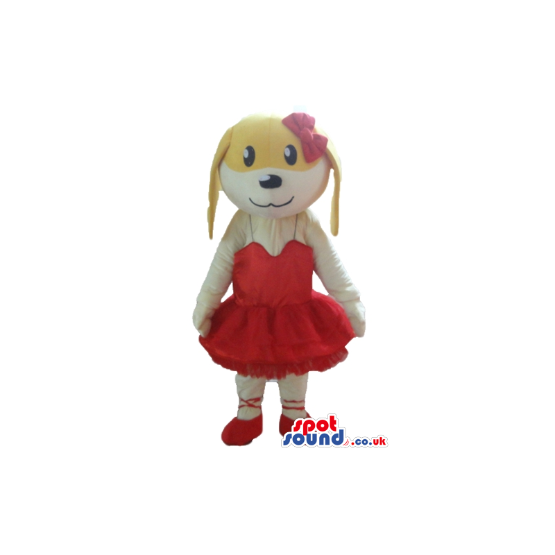 Female beige and white dog wearing a red ballet dress and red