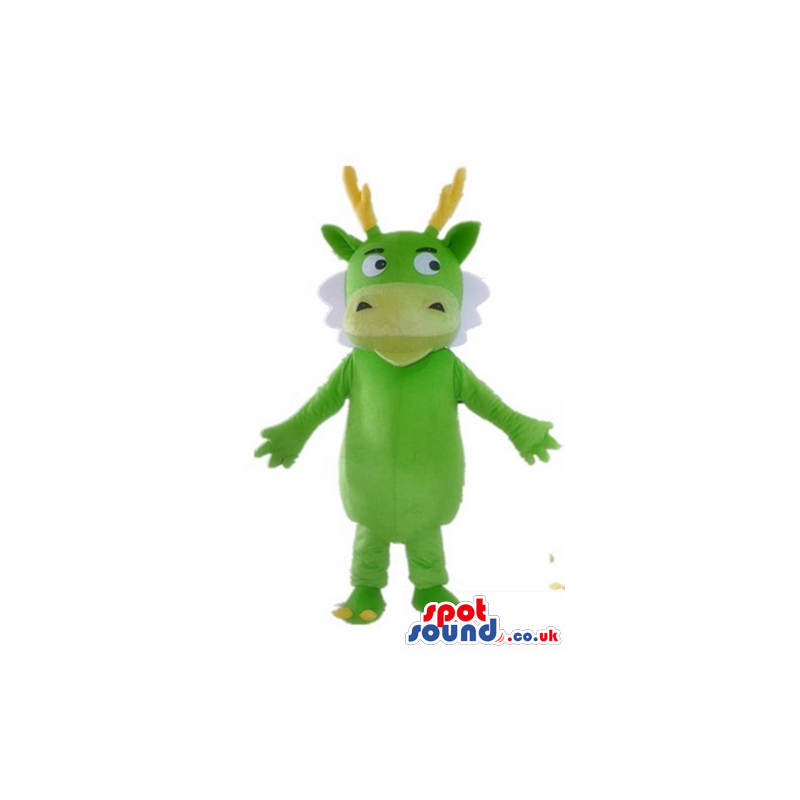 Light green monster with small eyes, yellow horns and white