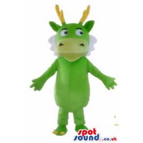 Light green monster with small eyes, yellow horns and white