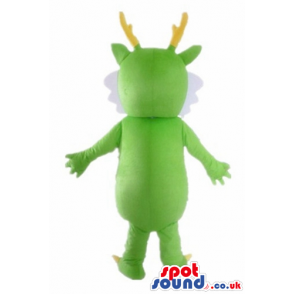 Light green monster with small eyes, yellow horns and white