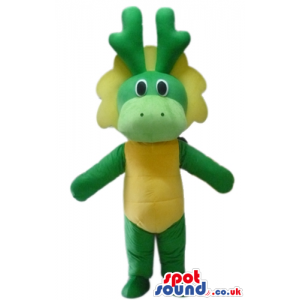 Green dragon with yellow belly, big eyes and green horns -
