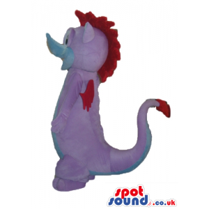 Cute light blue and purple dino with big eyes, two teeth, small