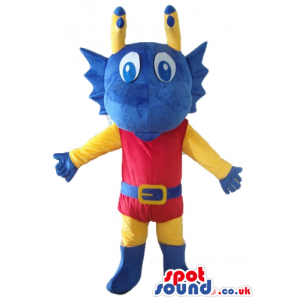 Blue monster with big eyes dressed in a red and yellow suit