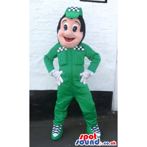 Delighted driver mascot with green outfit, hat and white gloves