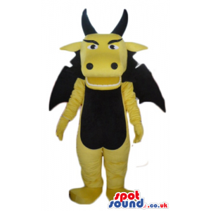 Fierceful yellow dragon with teeth, angry eyes, long black