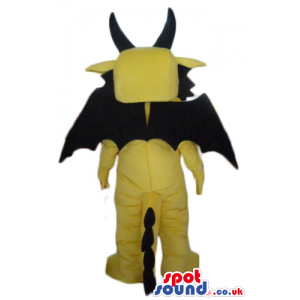 Fierceful yellow dragon with teeth, angry eyes, long black