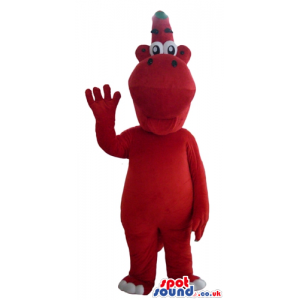 Red monster with huge nose, tiny eyes and white toe nails -