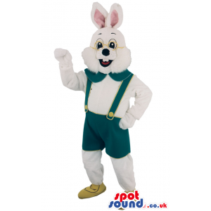 Fluffy white rabbit mascot with green trousers and strap