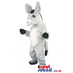 Donkey mascot in gray and black and with innocent smile -