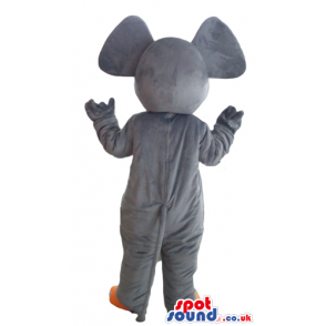 Grey elephant with orange ears and feet and picture on the