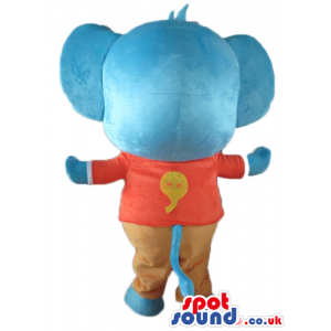 Blue elephant in a red and white t-shirt and brown trousers -