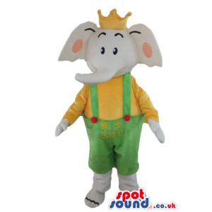 Grey elephant in a yellow t-shirt, green trousers and a yellow