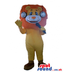 Brown lion with headphones holding a microphone - Custom Mascots