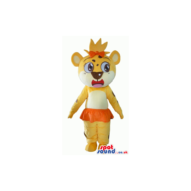 Yellow lioness with big eyes, an orange bow on the head and an
